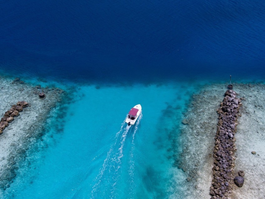 boat ocean stones aerial view PNG photo