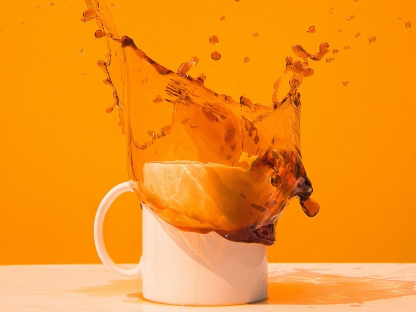 cup spray splash coffee drink PNG with clear transparency