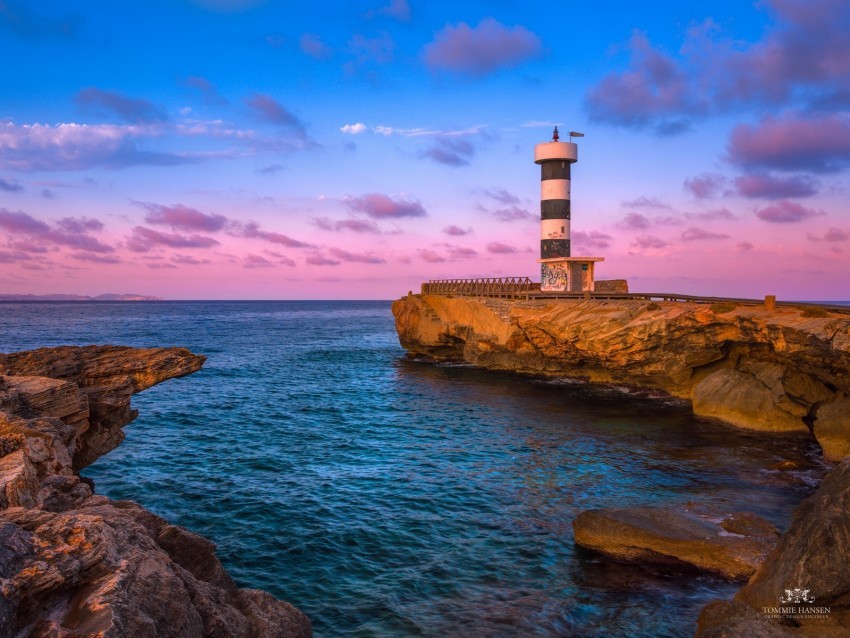 lighthouse bay sea rocks sunrise spain Isolated Icon on Transparent PNG