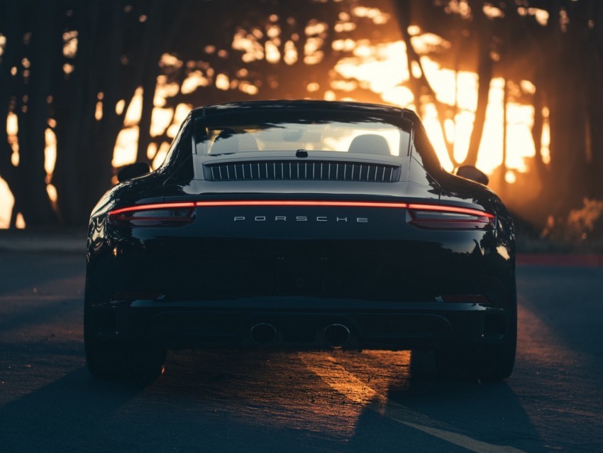 porsche sports car rear view black sunlight Isolated PNG Image with Transparent Background