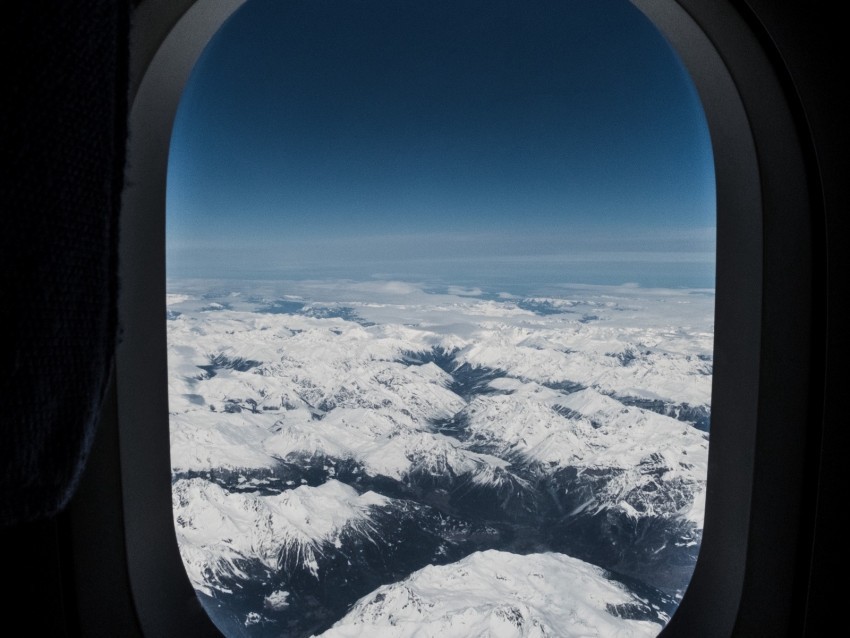 porthole airplane window mountains aerial view flight sky peaks PNG file without watermark